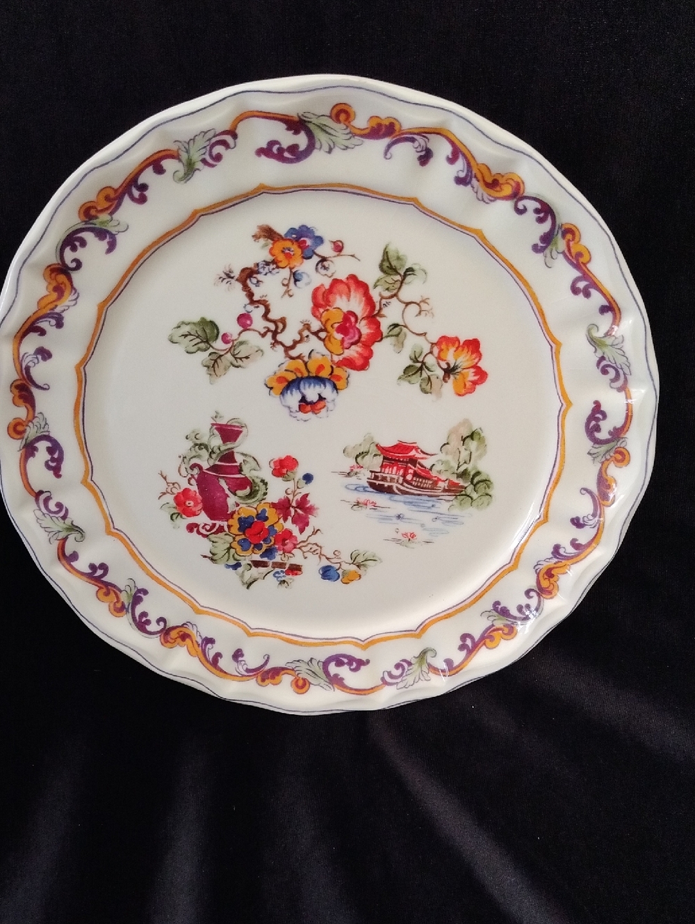 Vintage plate from the World Market WOM35 pattern.